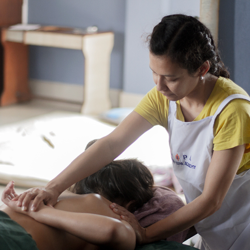 AIPA students performing Deep Tissue Massage