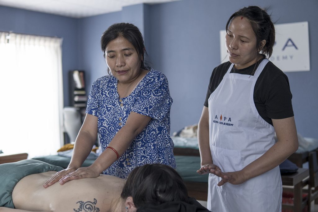 Reena Shrestha guiding massage therapy techniques - AIPA Nepal Spa Academy